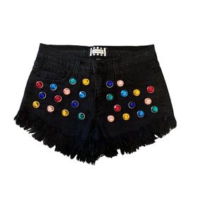 Brand new. Never worn gem cut off shorts.